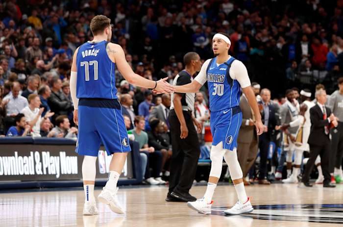Luka Doncic and Seth Curry during the 2019-20 season.